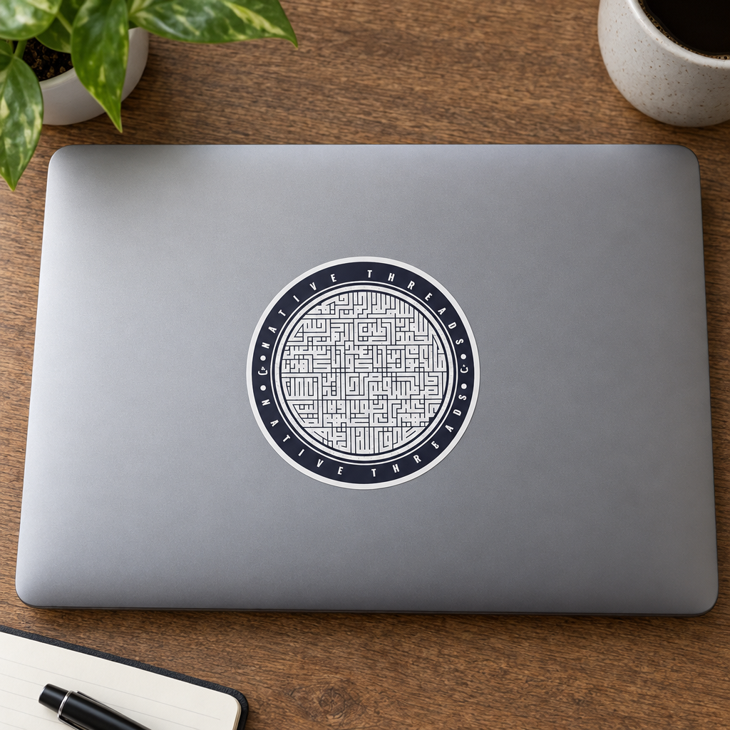 Al Fatiha Sticker, applied to a closed laptop on a desk.
