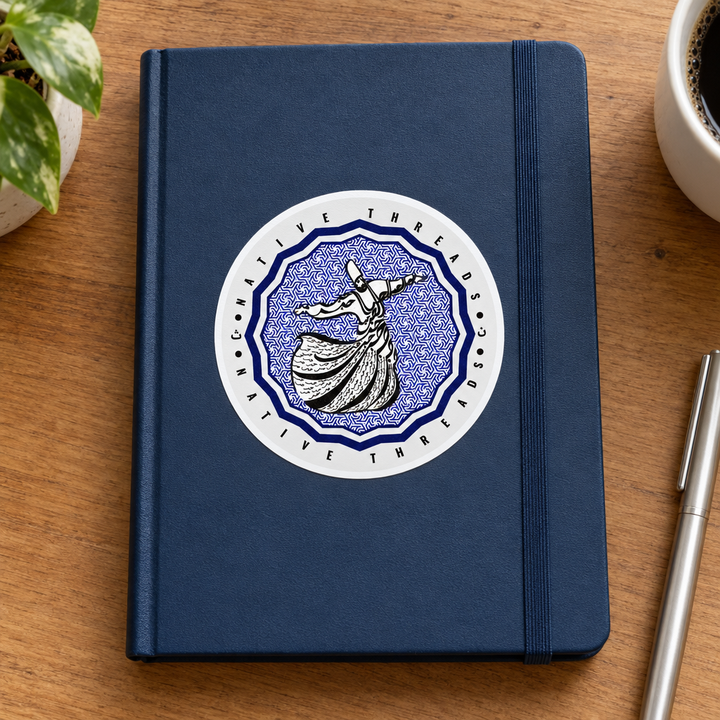 Dervish Hub Sticker, applied to a plain notebook on a desk.