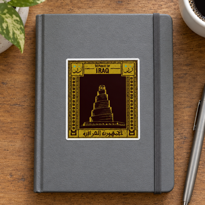 Iraq Postcard Sticker, applied to a plain notebook on a desk.