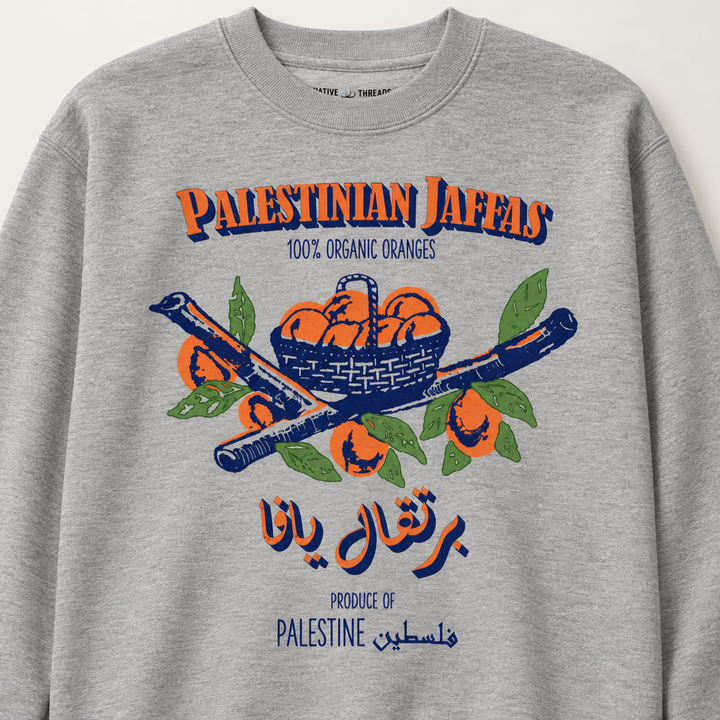 Palestinian Jaffas Sweater, close-up of the chest artwork and garment fabric.