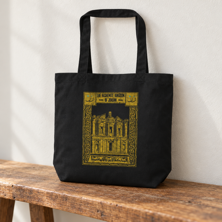 Jordan Postcard Tote Bag, standing on a wooden bench with the printed front visible.