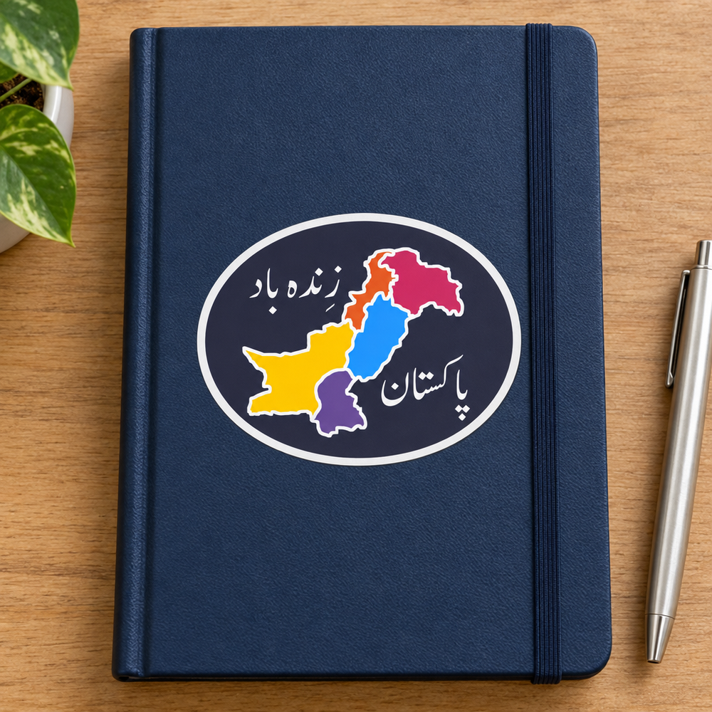 Pakistan Zindabad Sticker, applied to a plain notebook on a desk.