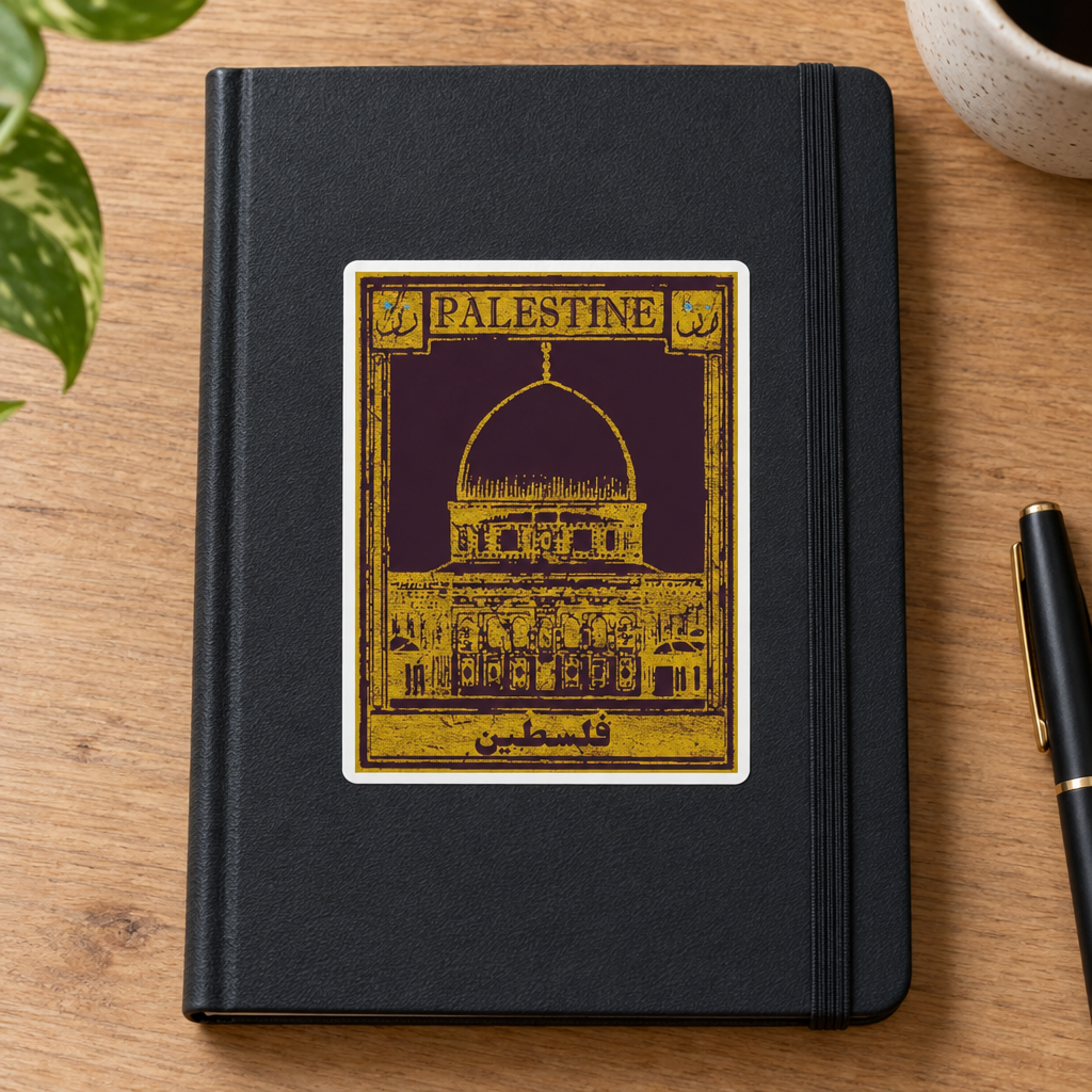 Palestine Postcard Sticker, applied to a plain notebook on a desk.