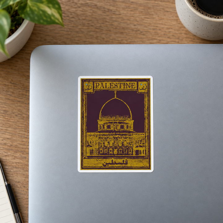 Palestine Postcard Sticker, applied to a closed laptop on a desk.
