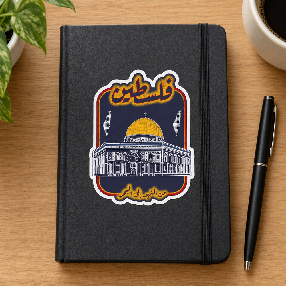 Vintage Palestine Sticker, applied to a plain notebook on a desk.